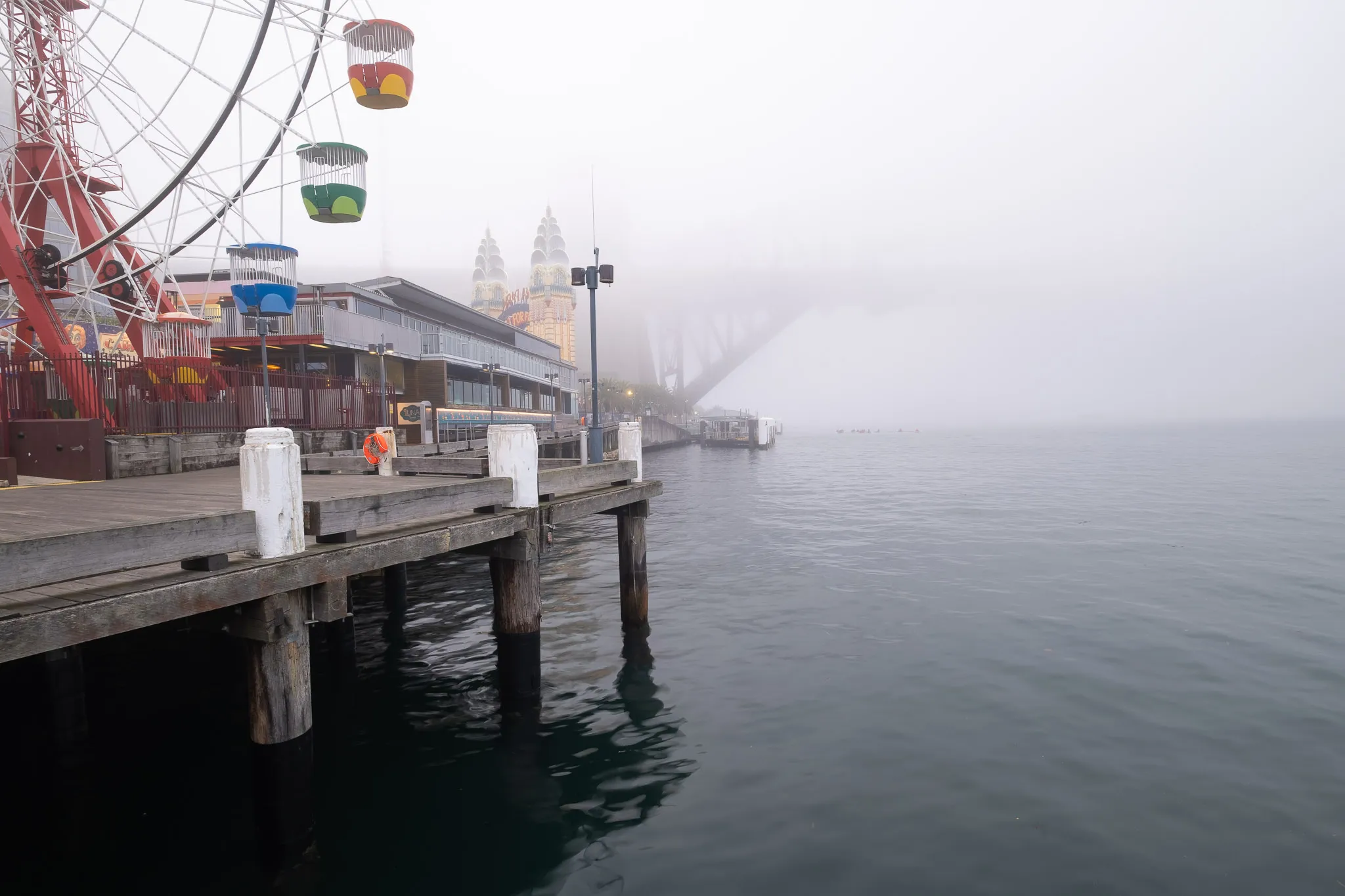 Foggy view of the Sydney Harbour near Lunar Park