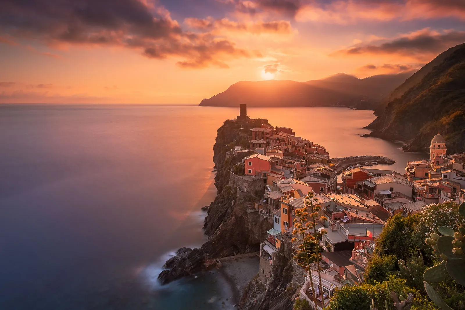 A spectacular golden sunset from the iconic view point in Vernazza, Cinque Terre.